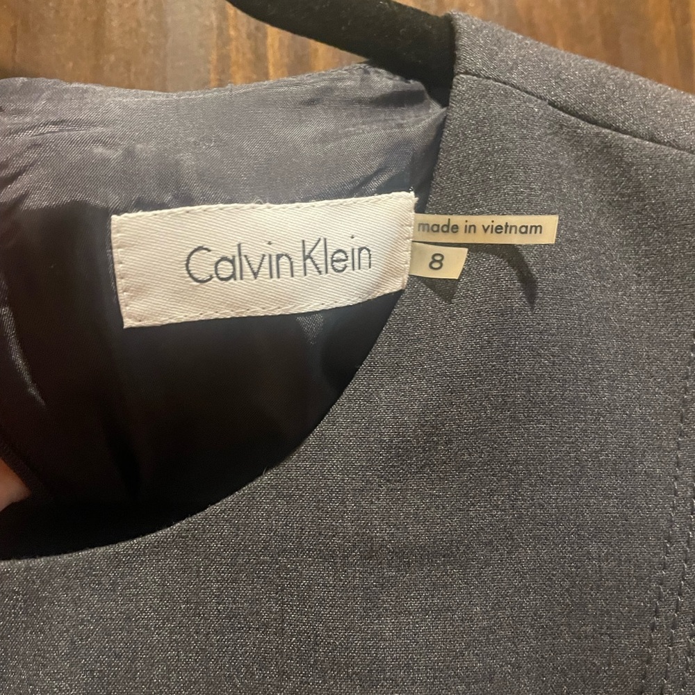 NWOT Calvin Klein 8 fully lined gray sheath dress. Belt missing. Nice neutral!